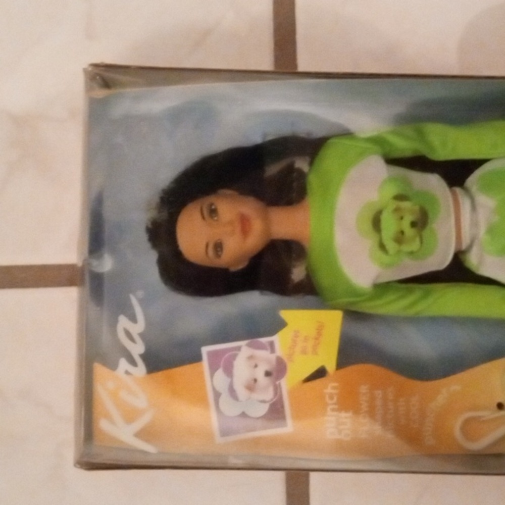 Barbie doll friend Kira #28704 NRFB Vintage from 2000.  Price Is Firm.